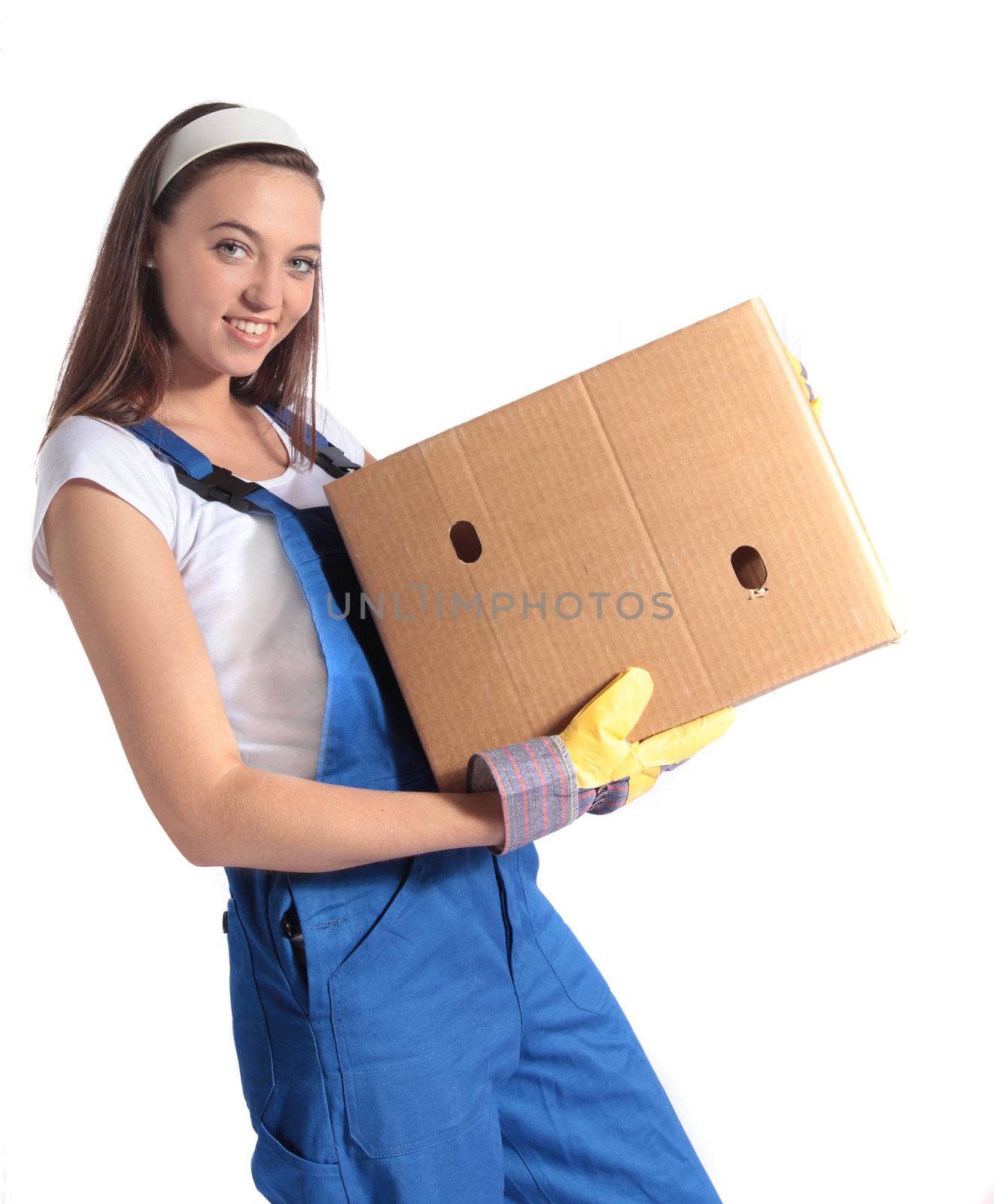 An attractive young woman carrying a moving box. All isolated on white background.