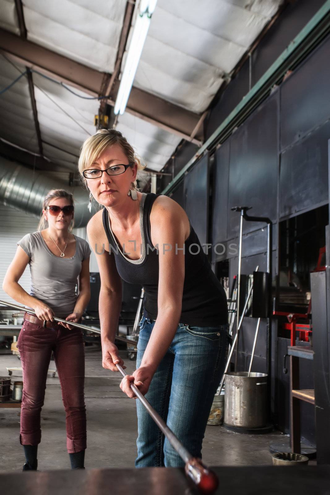 Lady Working with Molten Glass by Creatista