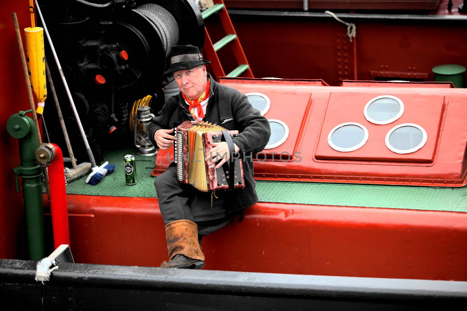Finnish Steamship captain, plays the accordion