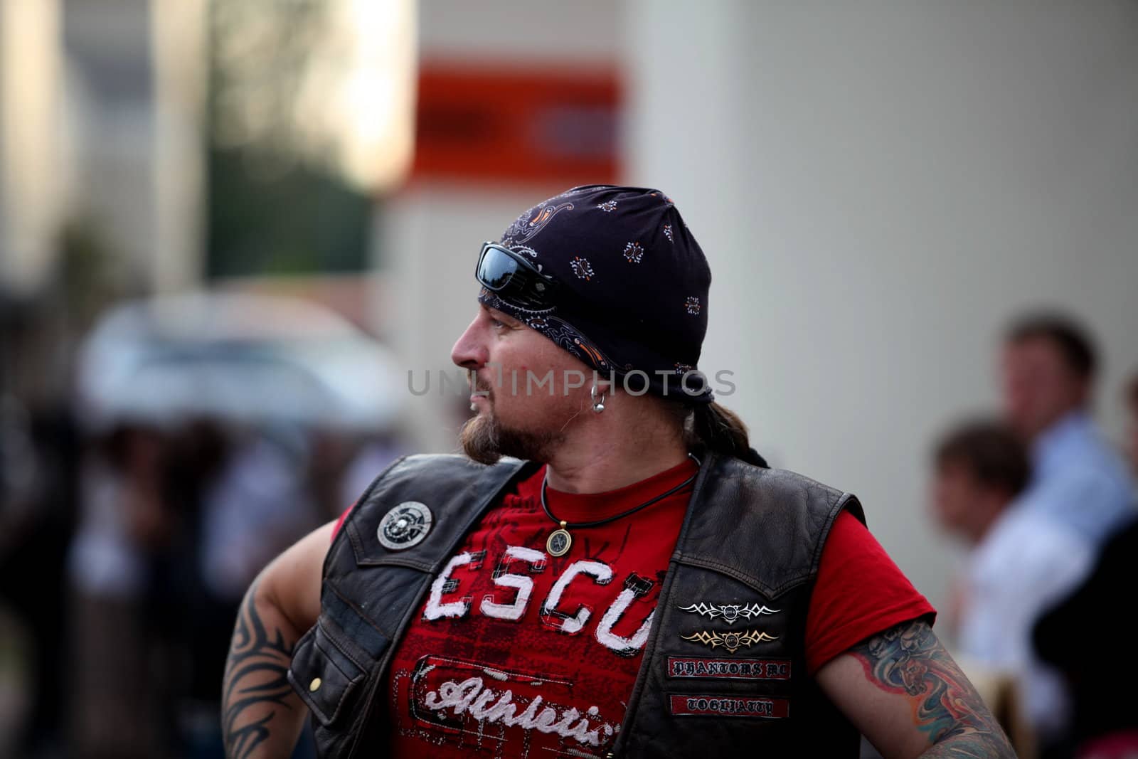 man with a tattoo, portrait, side view