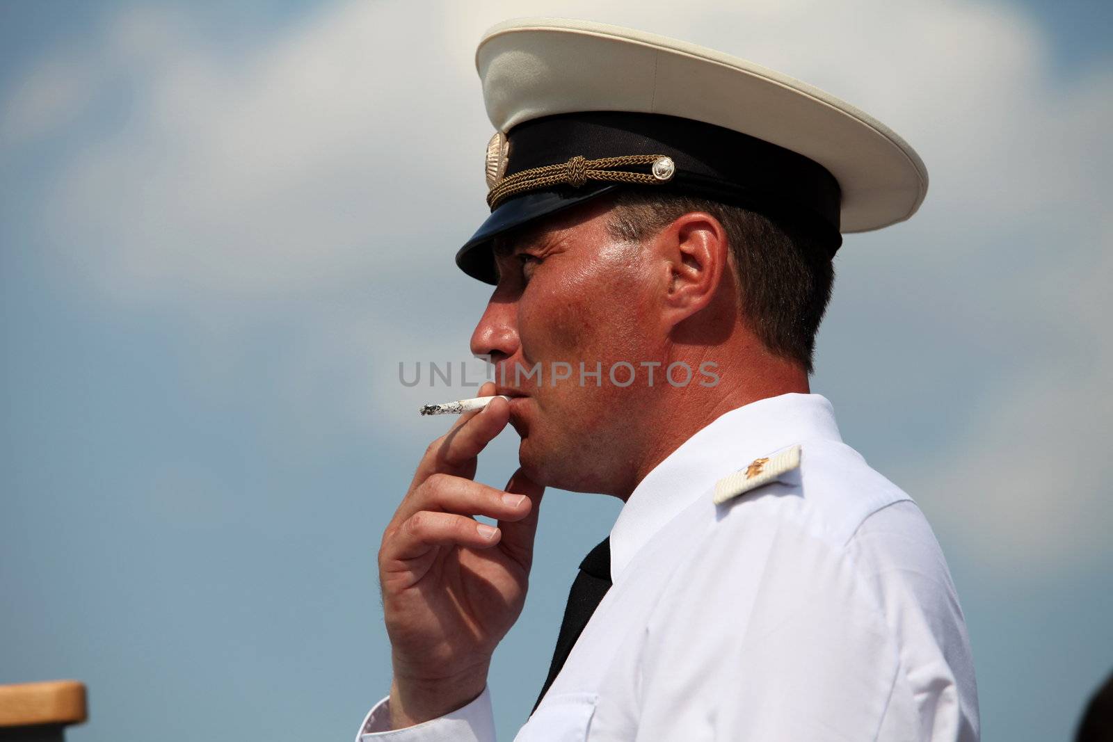 Russian Navy Warrant Officer smoking, portrait, side view