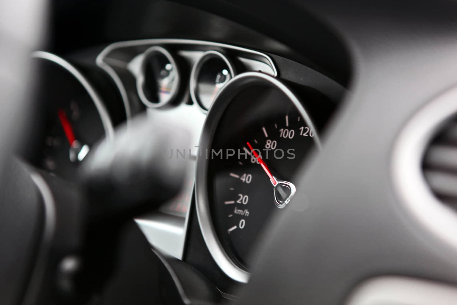 Illuminated car dashboard in red and black
