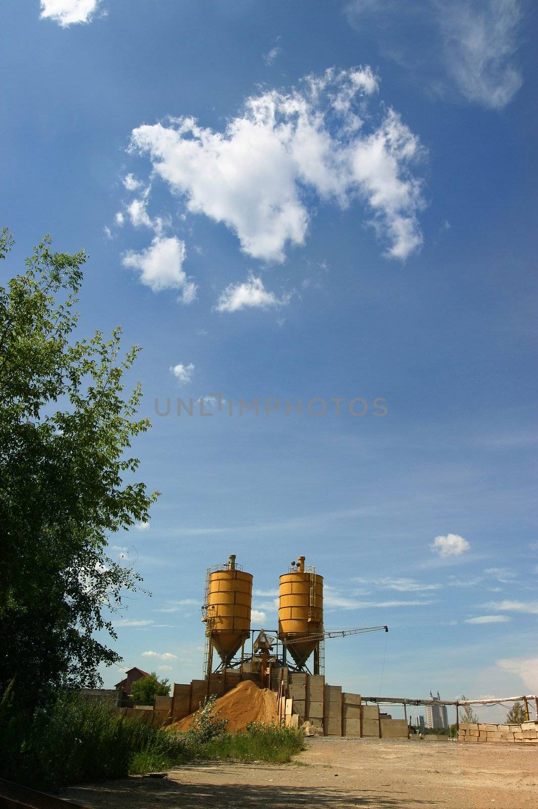 Factory details on a background of the sky