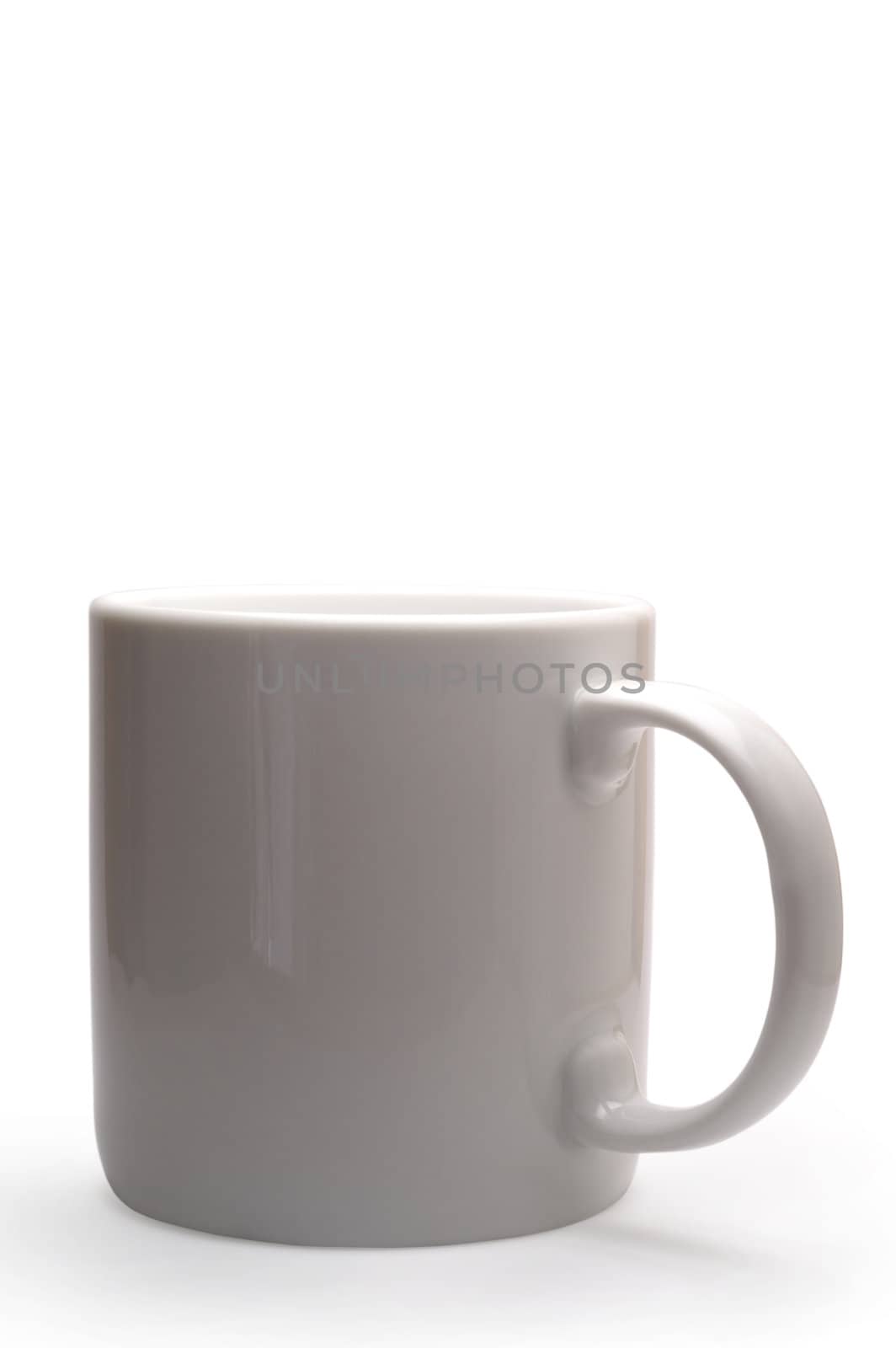 White mug isolated in white with clipping path by Laborer