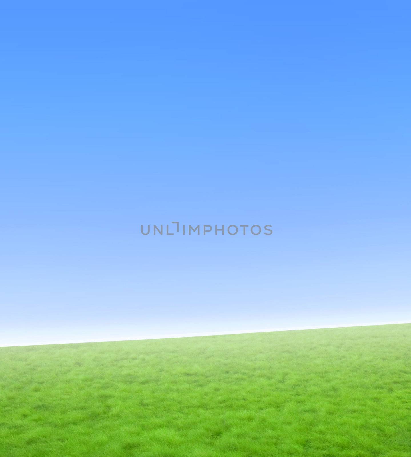 Beautiful simple nature background with green grass and a gradient blue sky. Diagonal horizon.