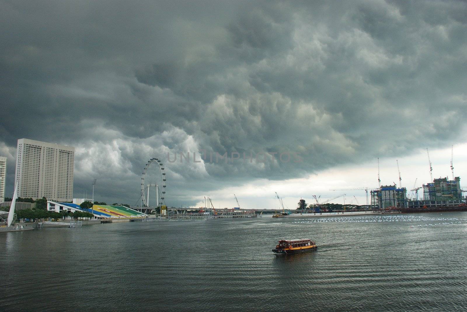 A view of singapore city under clouds just before rain comes