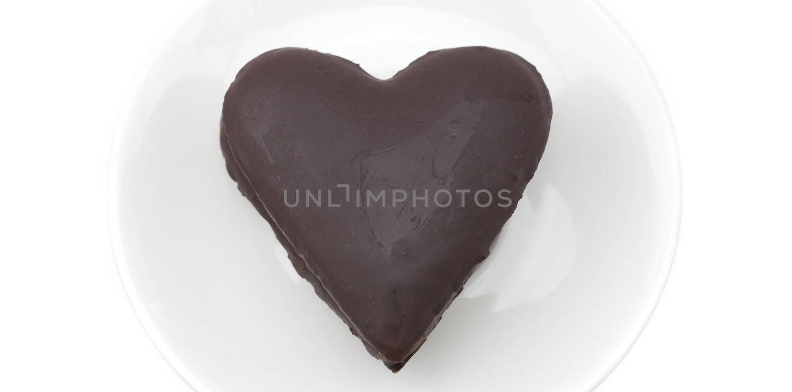 cake in a heart isolated on white