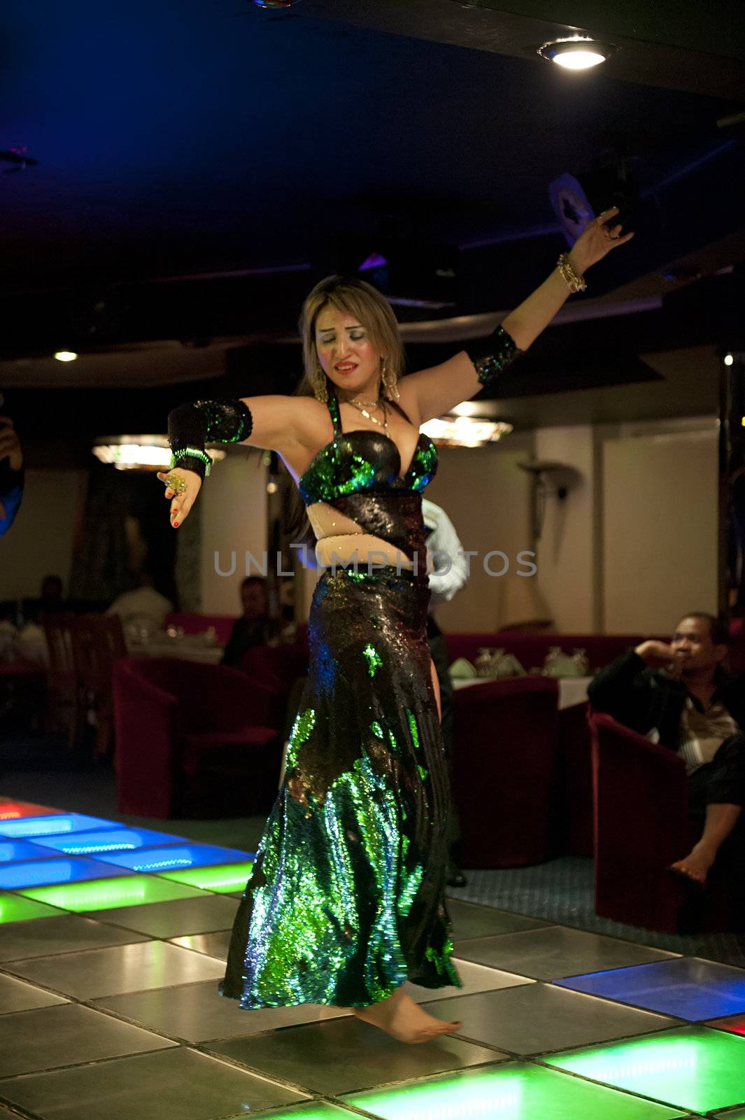 CAIRO - JAN 27: belly dancer performing on a yacht in River Nile.Jan 27,2013 in Cairo,Egypt.