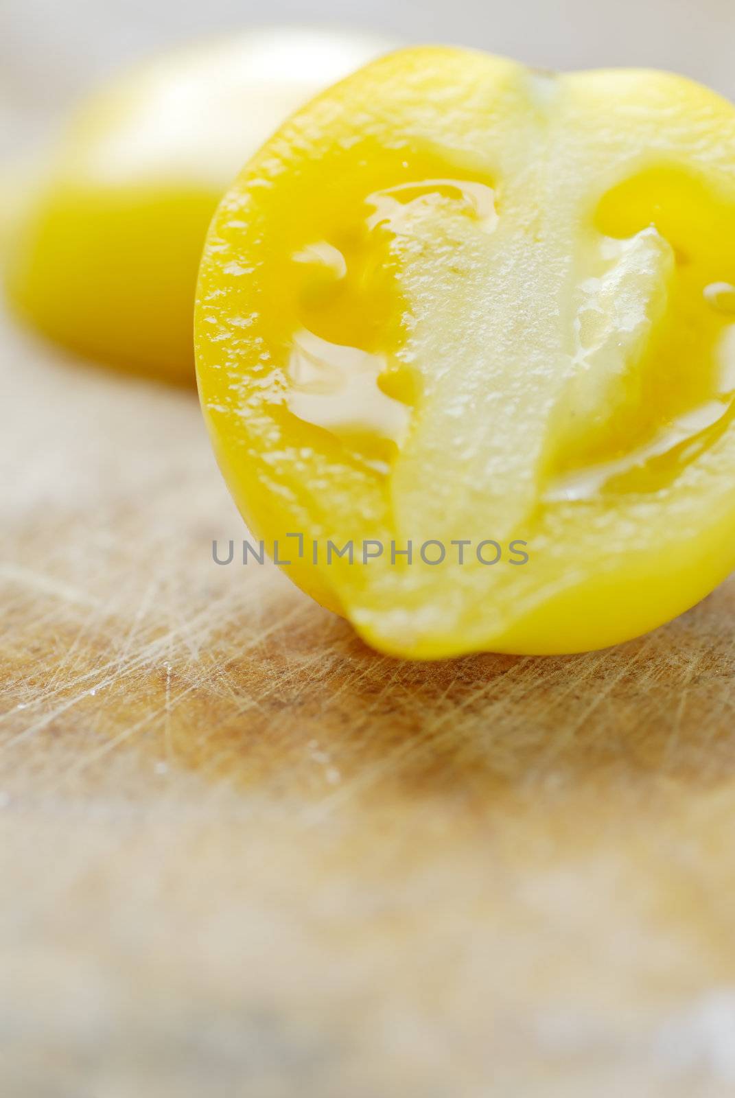 One 'Lemon Tree' tomato sliced.