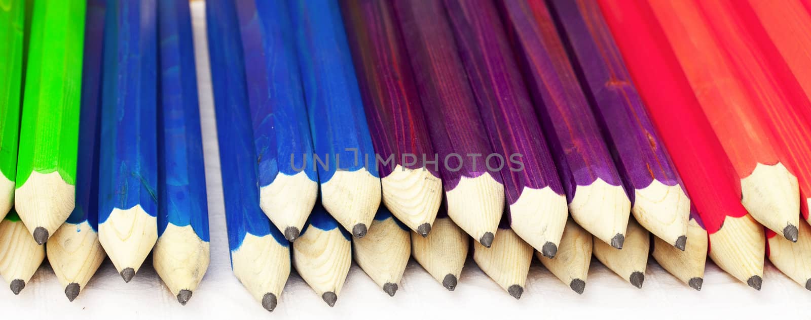 background of colored pencils by jannyjus