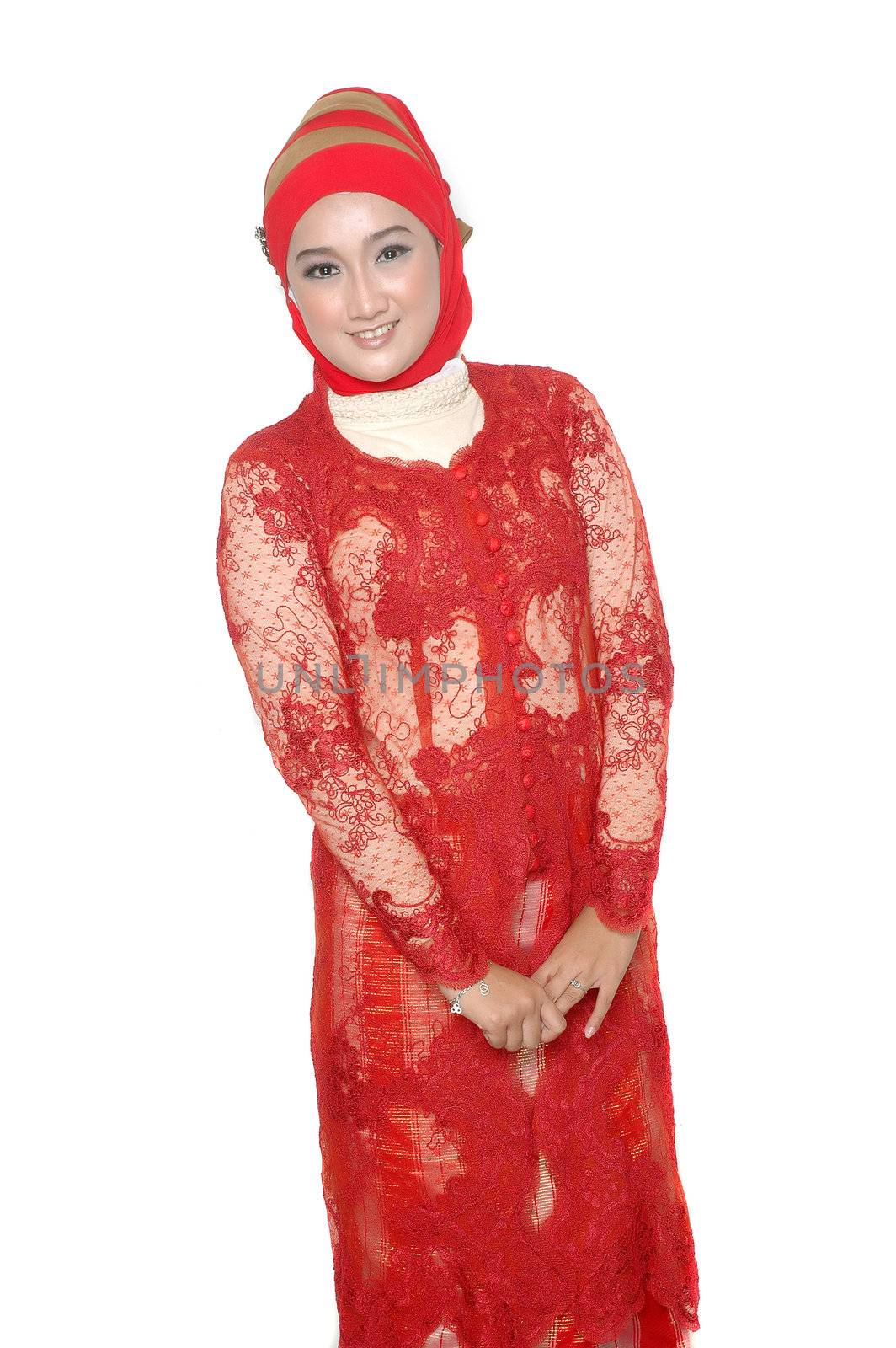portrait of an asian young girl dressed in kebaya traditional isolated on white background
