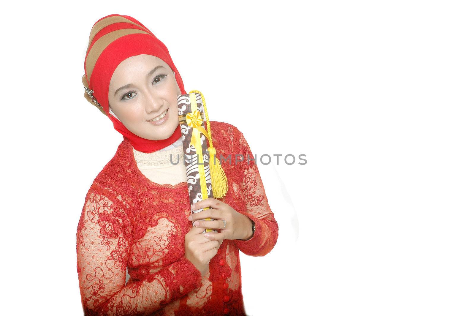 portrait of an asian young girl  holds a diploma of graduation isolated on white background