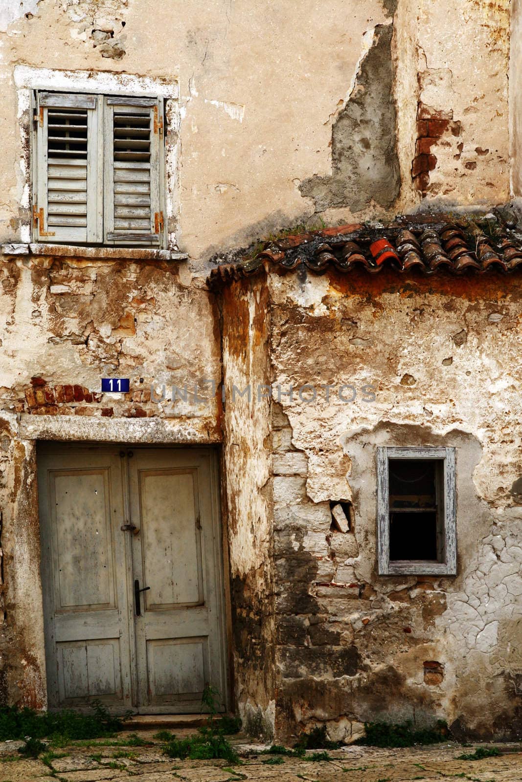 Wall of the ruined house in Fazhana. Croatia. Europe 