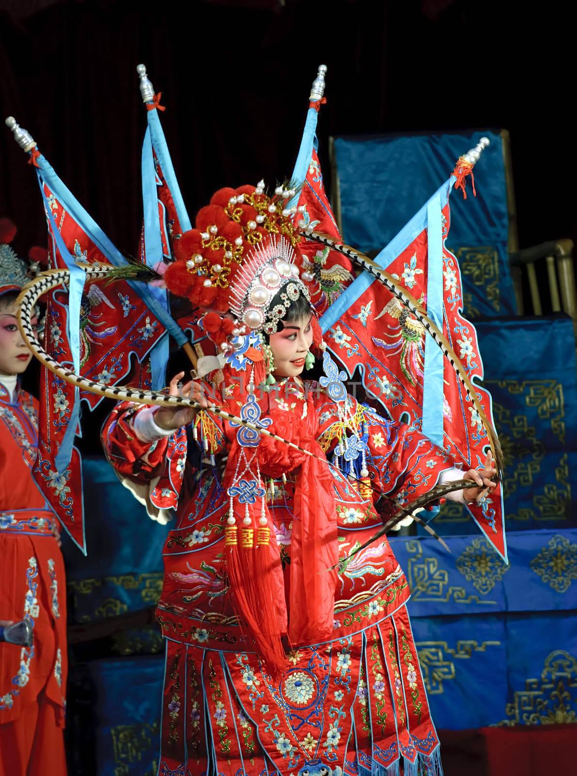 pretty chinese traditional opera actress with theatrical costume