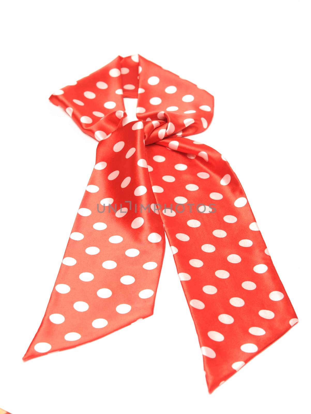 dotted red satin gift bow isolated on white by inxti