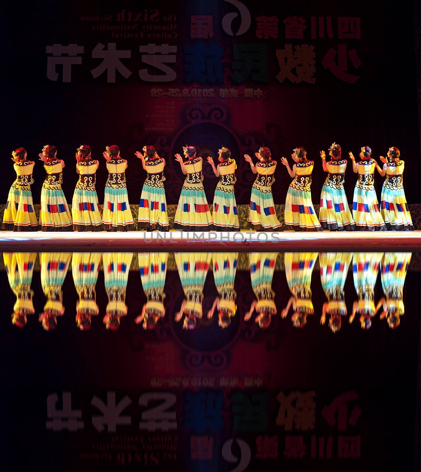 CHENGDU - SEP 28: chinese Yi ethnic dancers perform on stage in the 6th Sichuan minority nationality culture festival at JINJIANG theater.Sep 28,2010 in Chengdu, China.