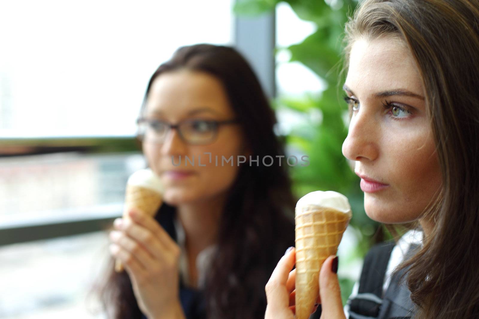 women licking ice cream  by Yellowj