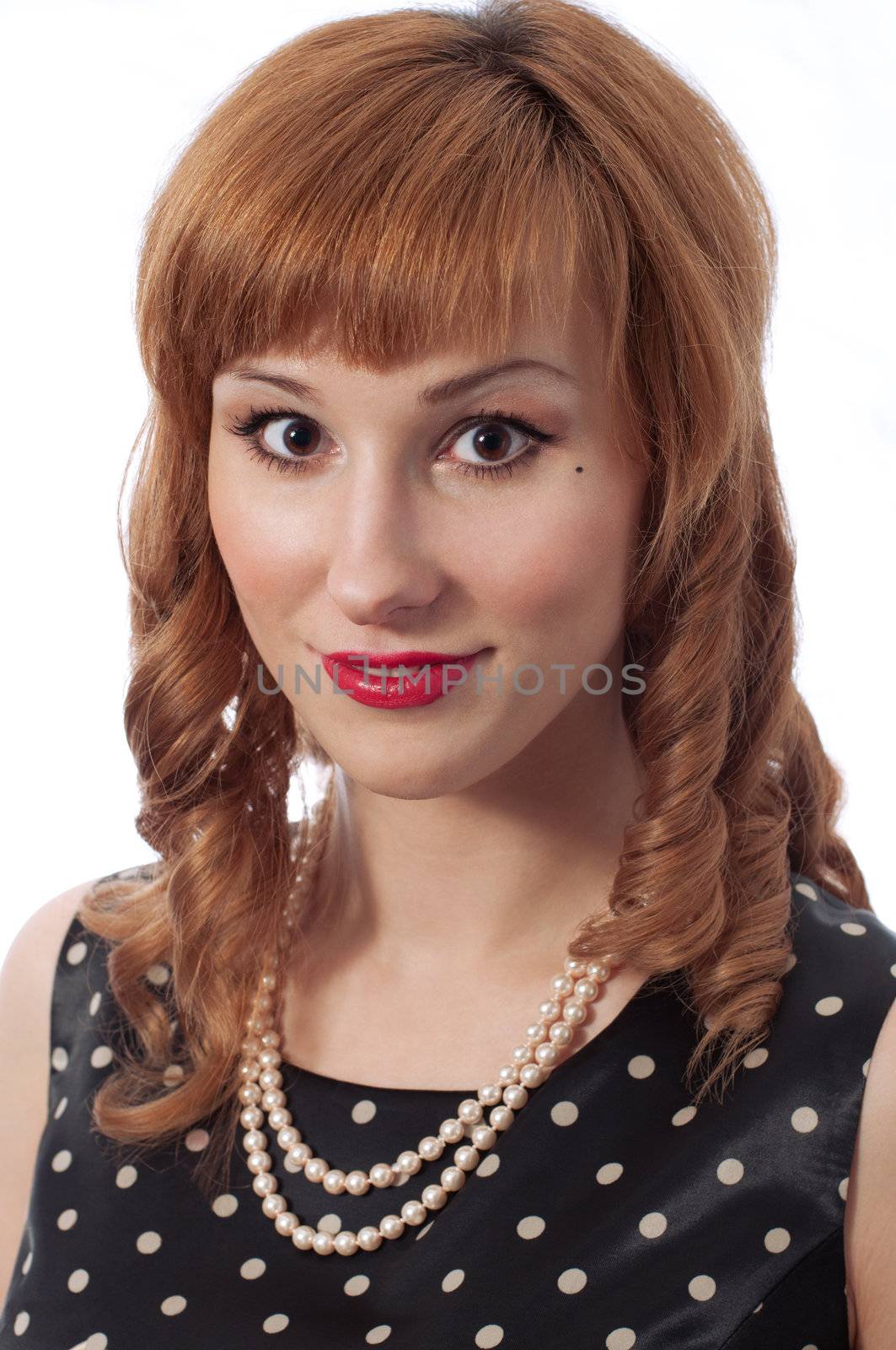 Retro girl with pearl necklace smiling