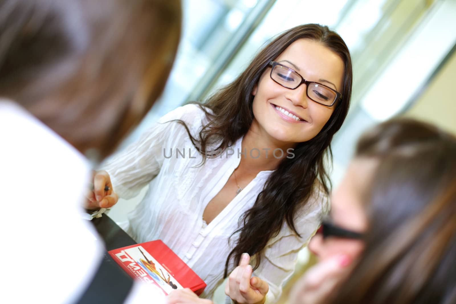 smiling girl thinking on examinination