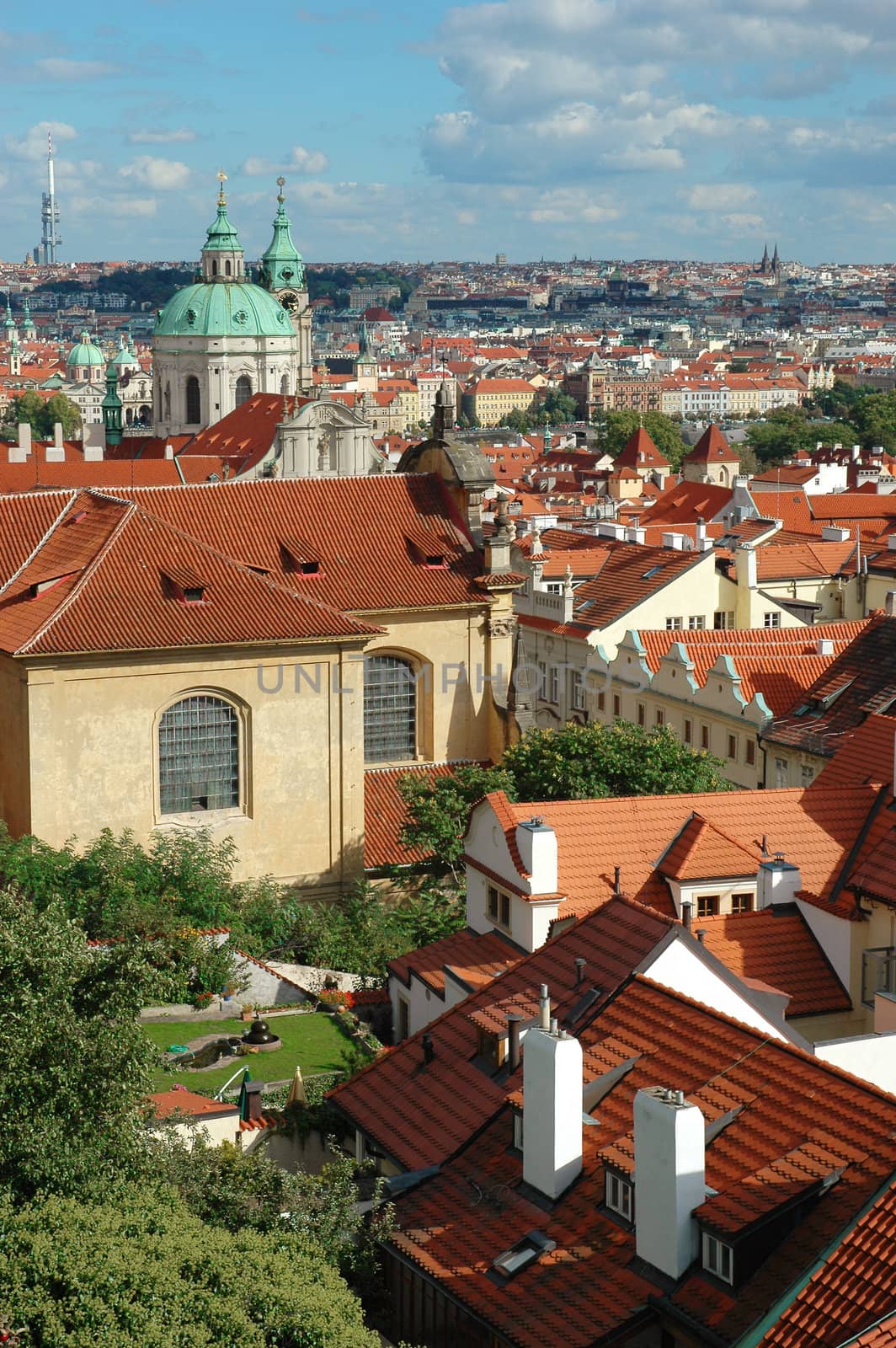 St. Nicholas Church and the red roofs in Lesser Town, Prague, Czech Republic