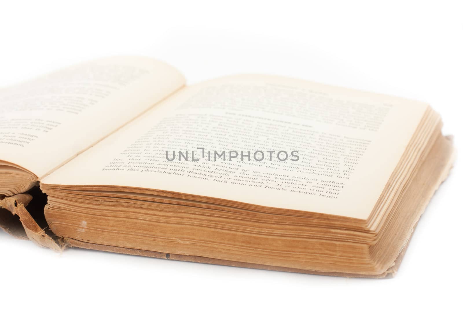 opened antique book on isolated white background