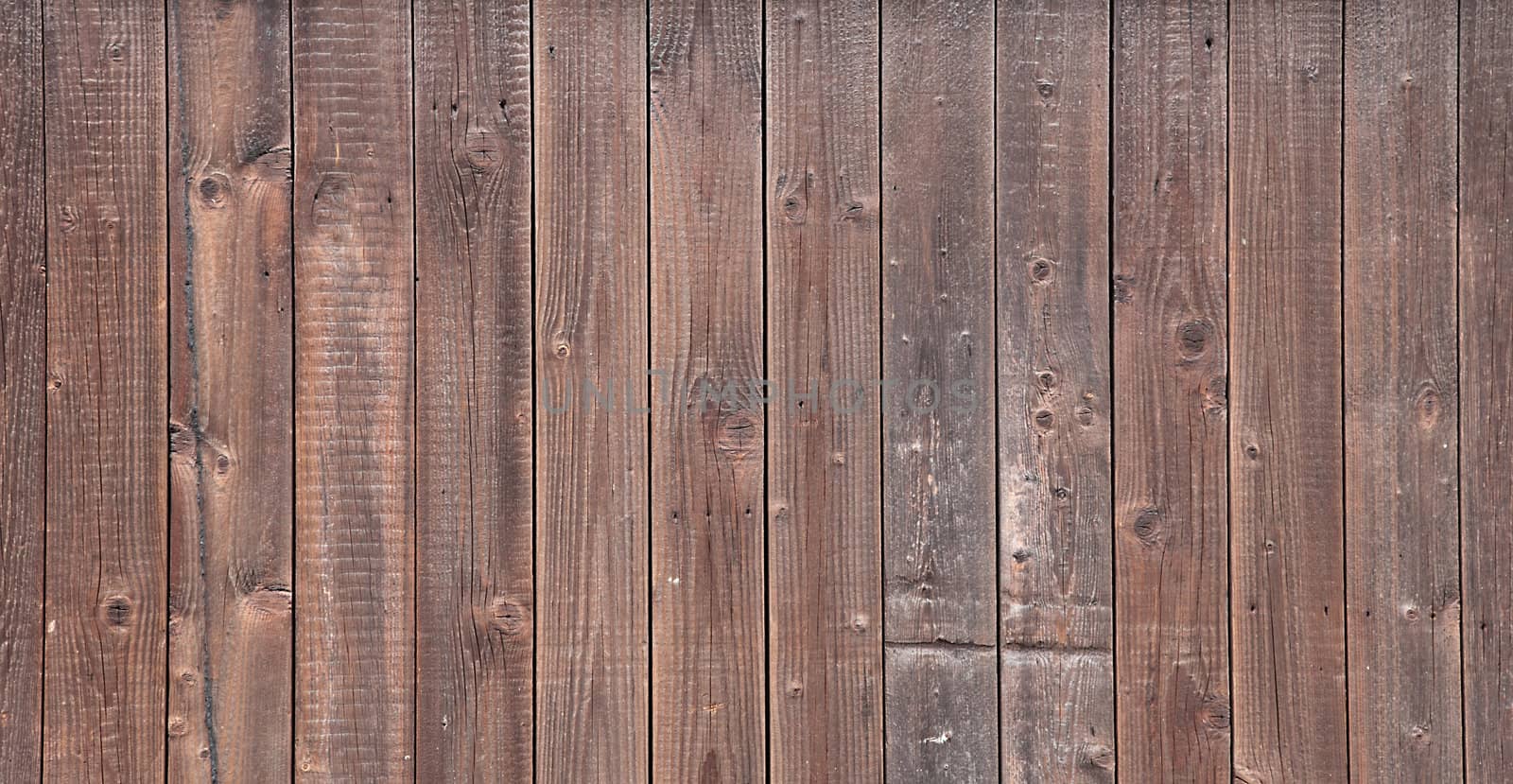 A simple background texture of a wooden fence.