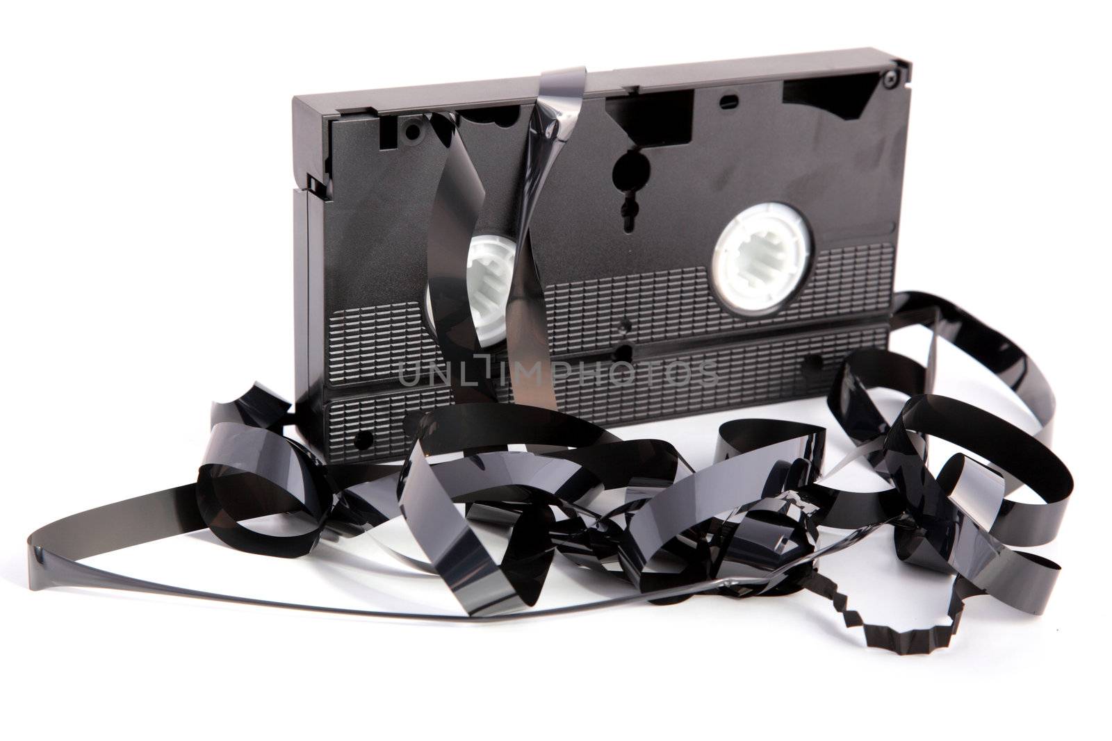 A broken VHS cassette. All isolated on white background.