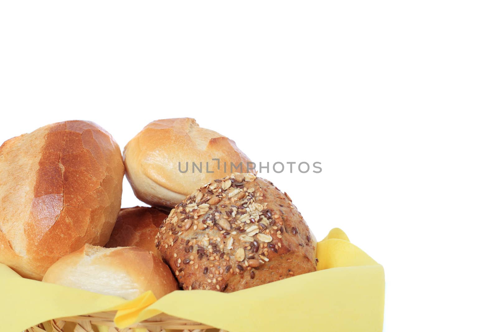 Basket with various rolls. All on white background.