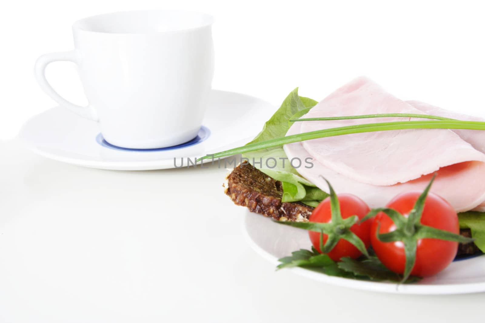 Fine served granary bread with boiled ham. All on white background.