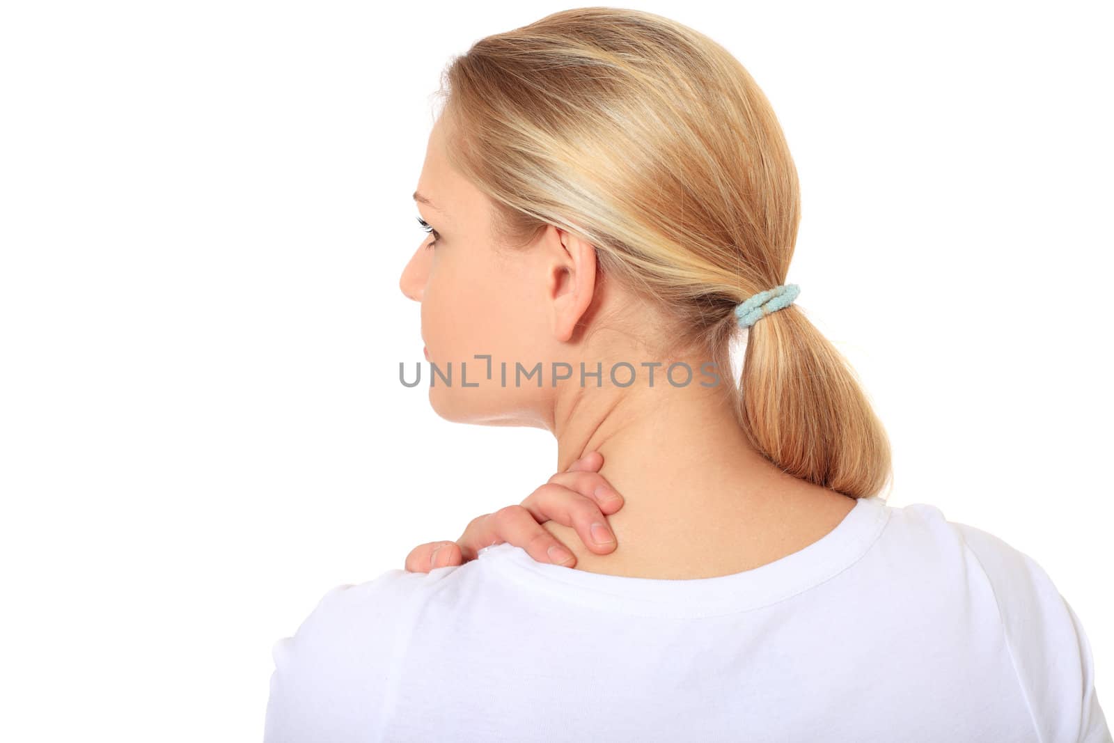 Attractive blond woman suffering from neck pain. All on white background.