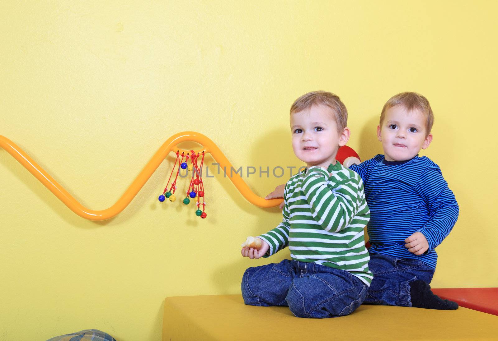 Kids playing in kindergarten.