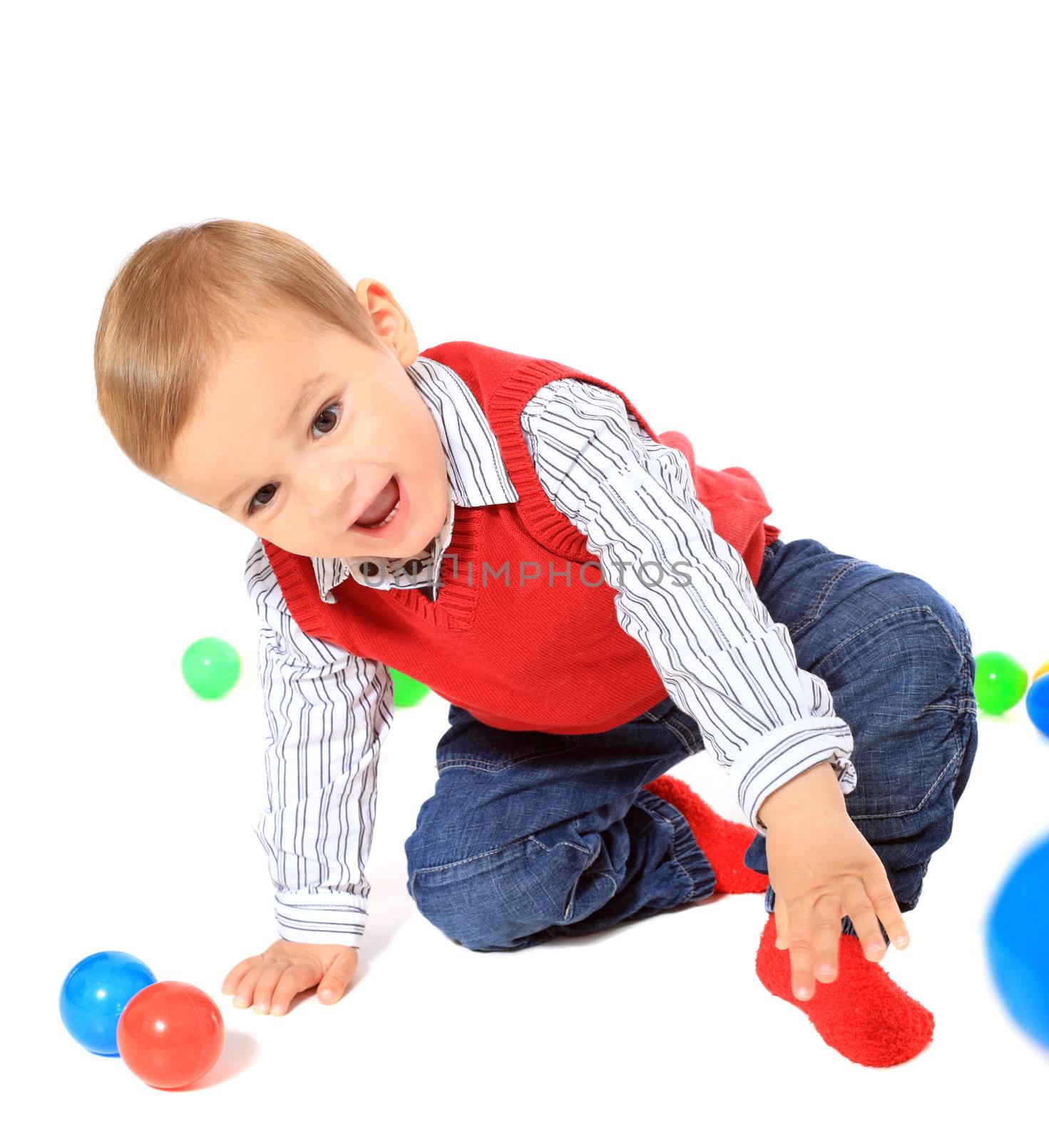 Cute caucasian toddler clowning around. All isolated on white background.