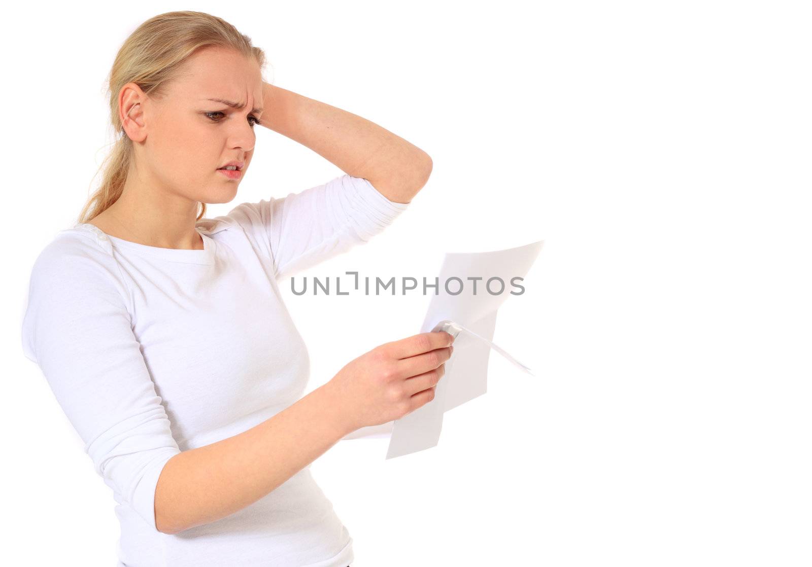 Attractive blond woman getting bad news. All on white background.