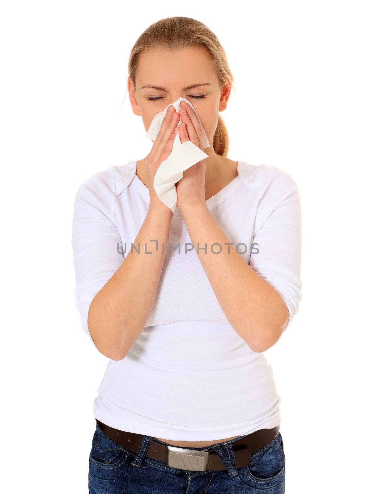 Attractive blonde woman using tissue. All on white background.