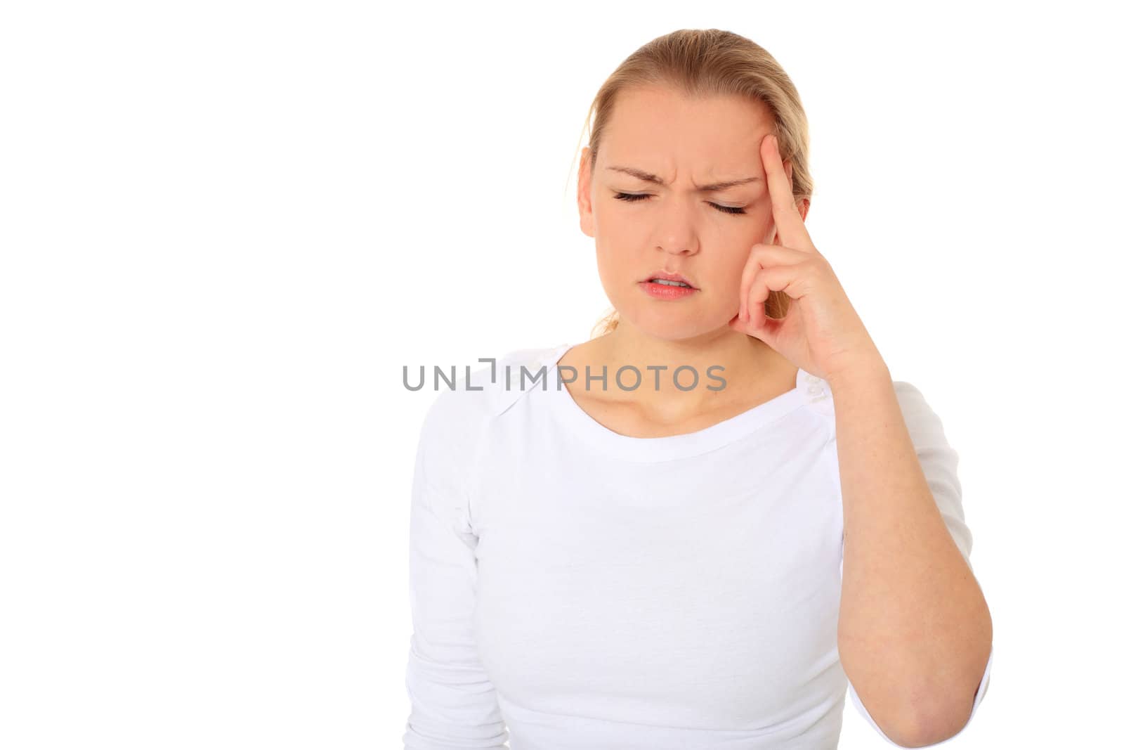 Attractive blond woman suffering from headache. All on white background.