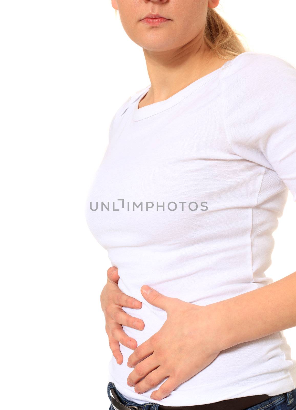 Attractive blonde woman suffering from stomachache. All on white background.