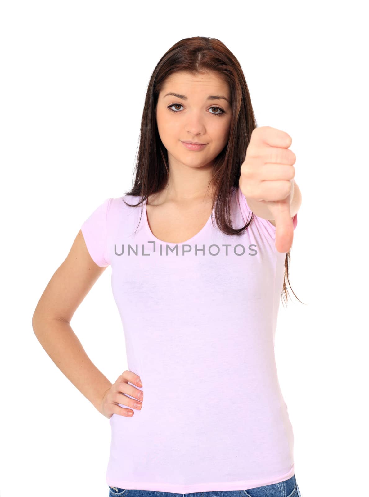 Attractive teenage girl making negative gesture. All on white background.