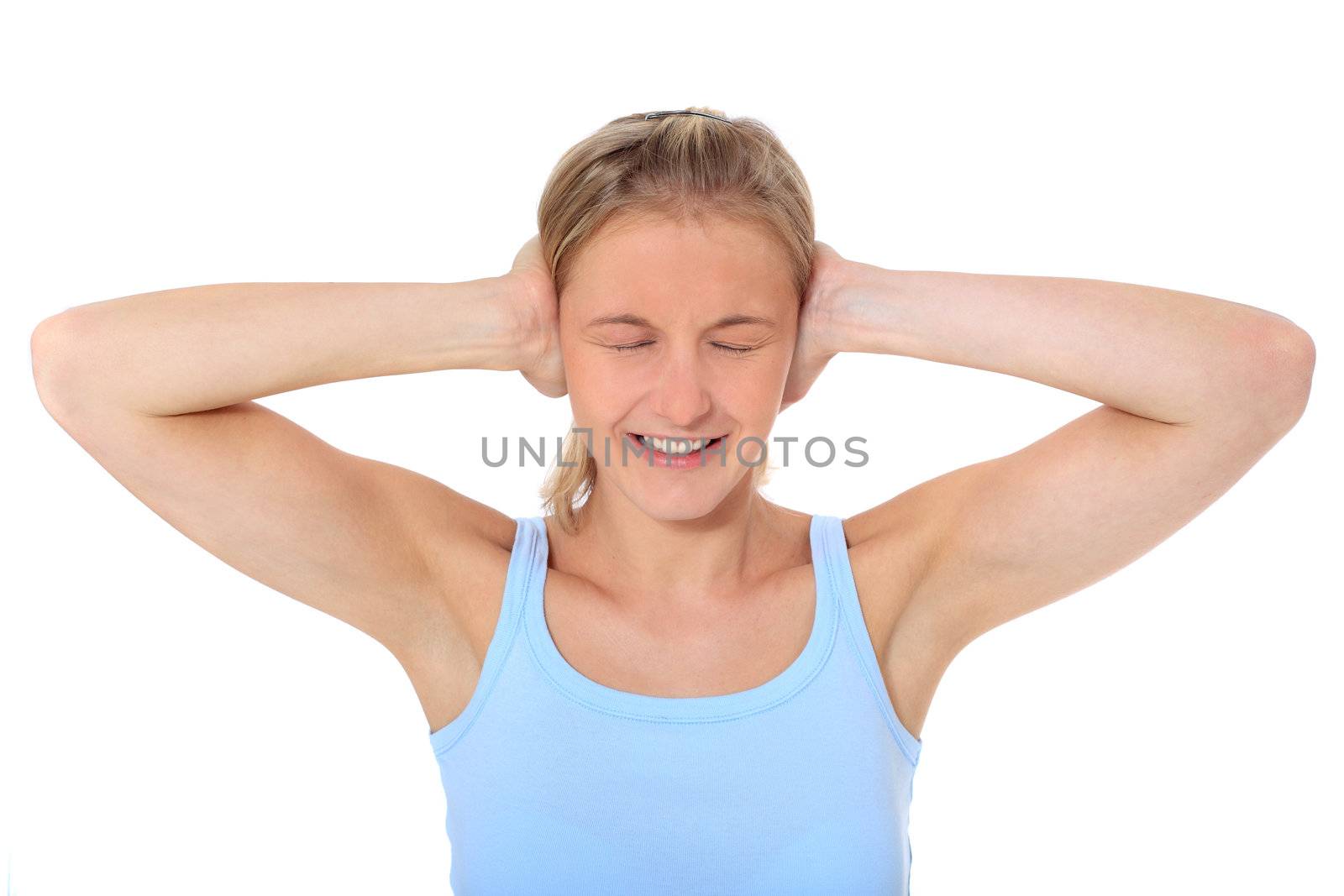 Attractive young scandinavian woman suffering from noise. All on white background.