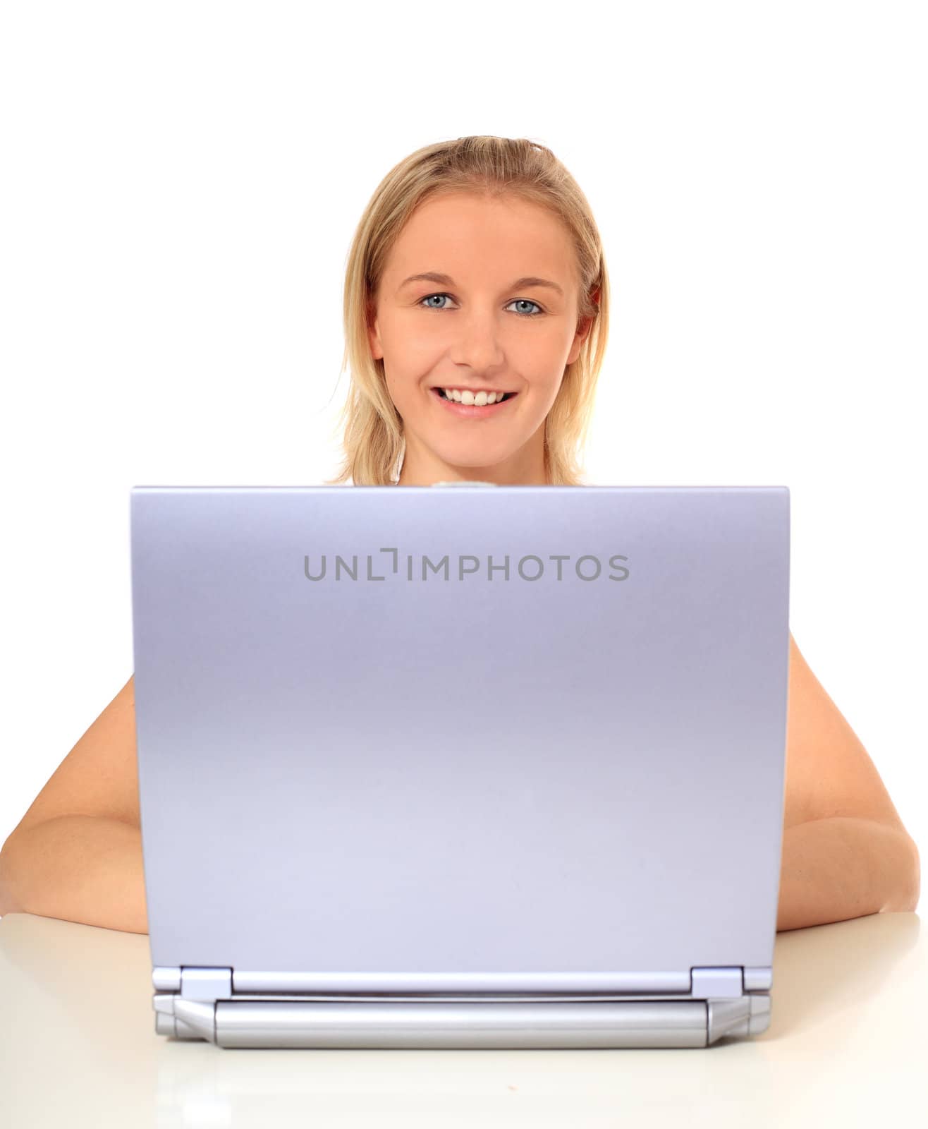 Attractive young scandinavian woman using notebook computer. All on white background.