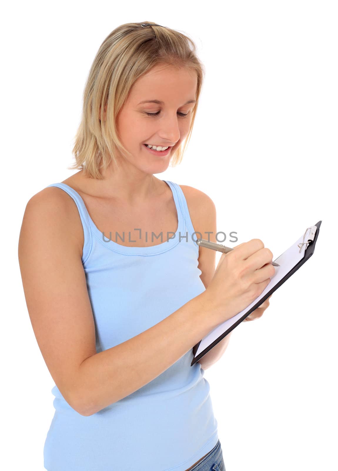 Attractive young scandinavian woman jots something down. All on white background.