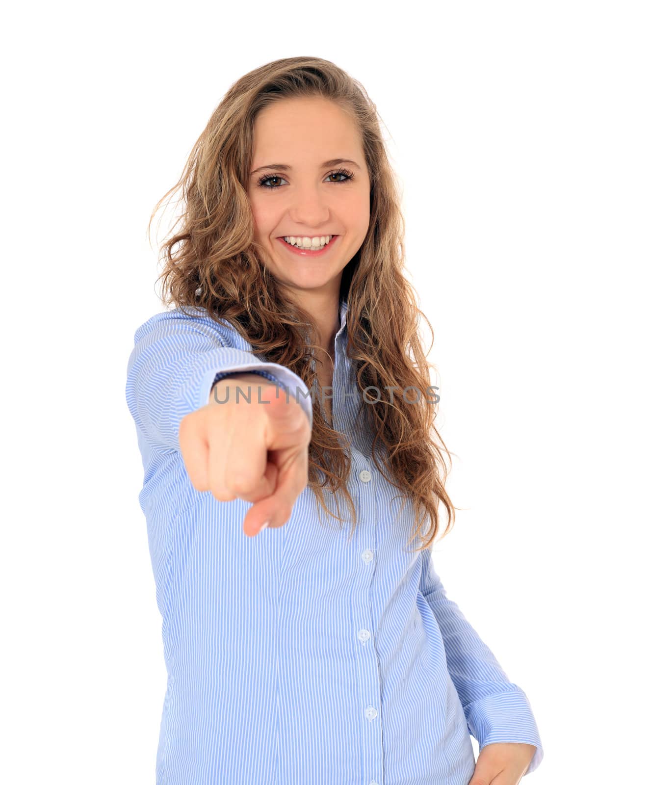 Attractive young girl pointing with finger. All on white background.