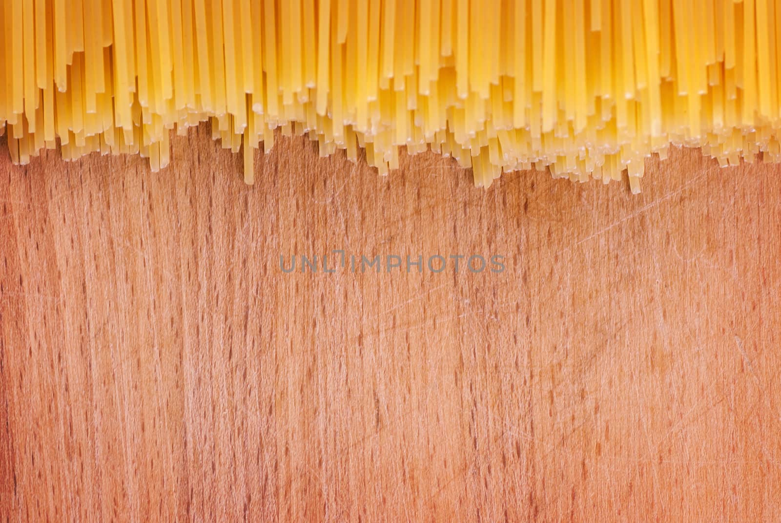 pasta on a wooden board, background