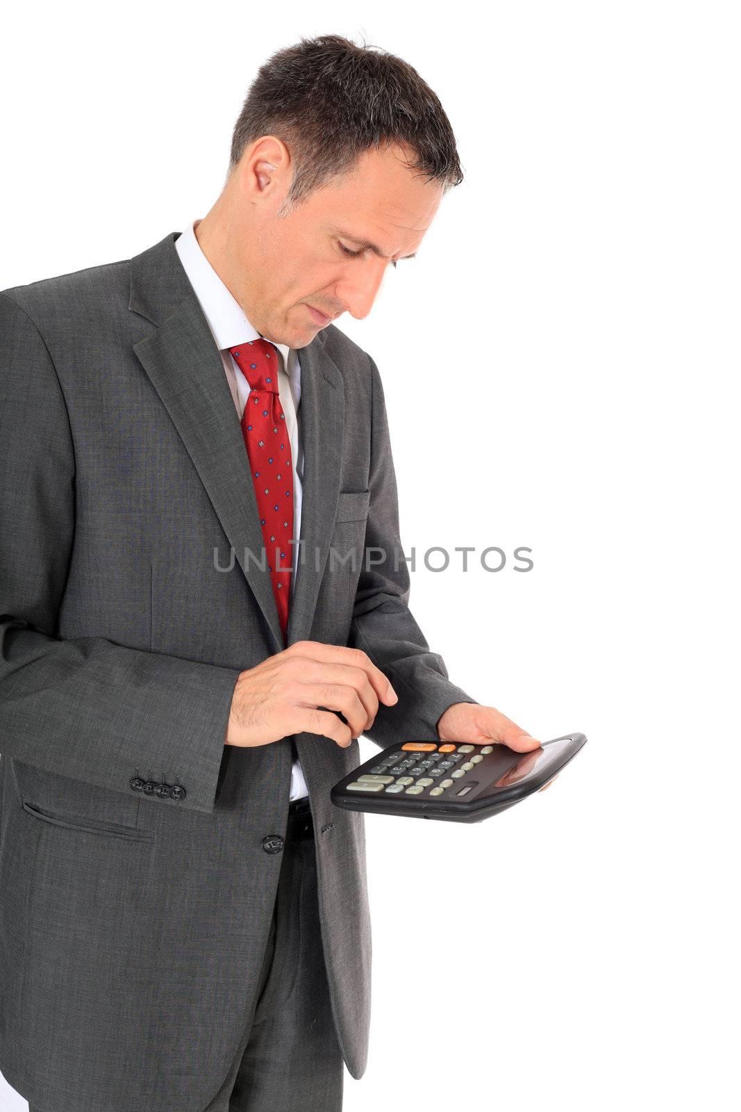 Attractive businessman using calculator. All on white background.
