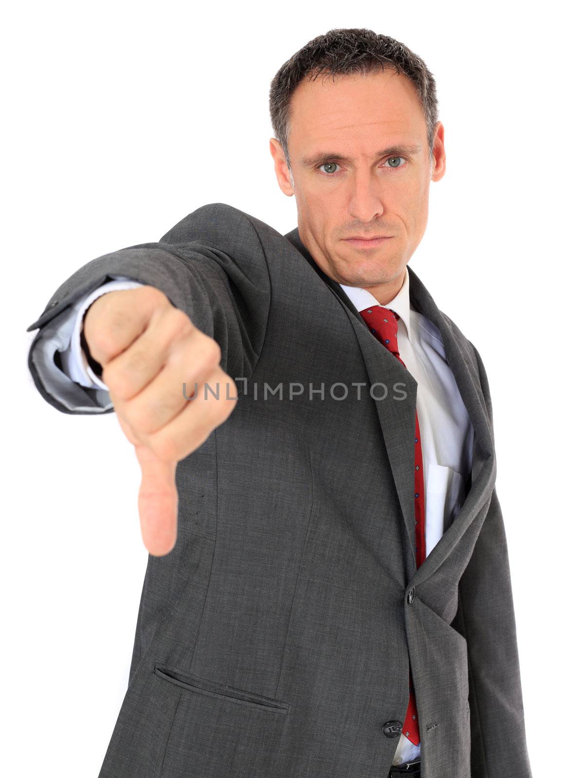 Attractive businessman making negative gesture. All on white background.