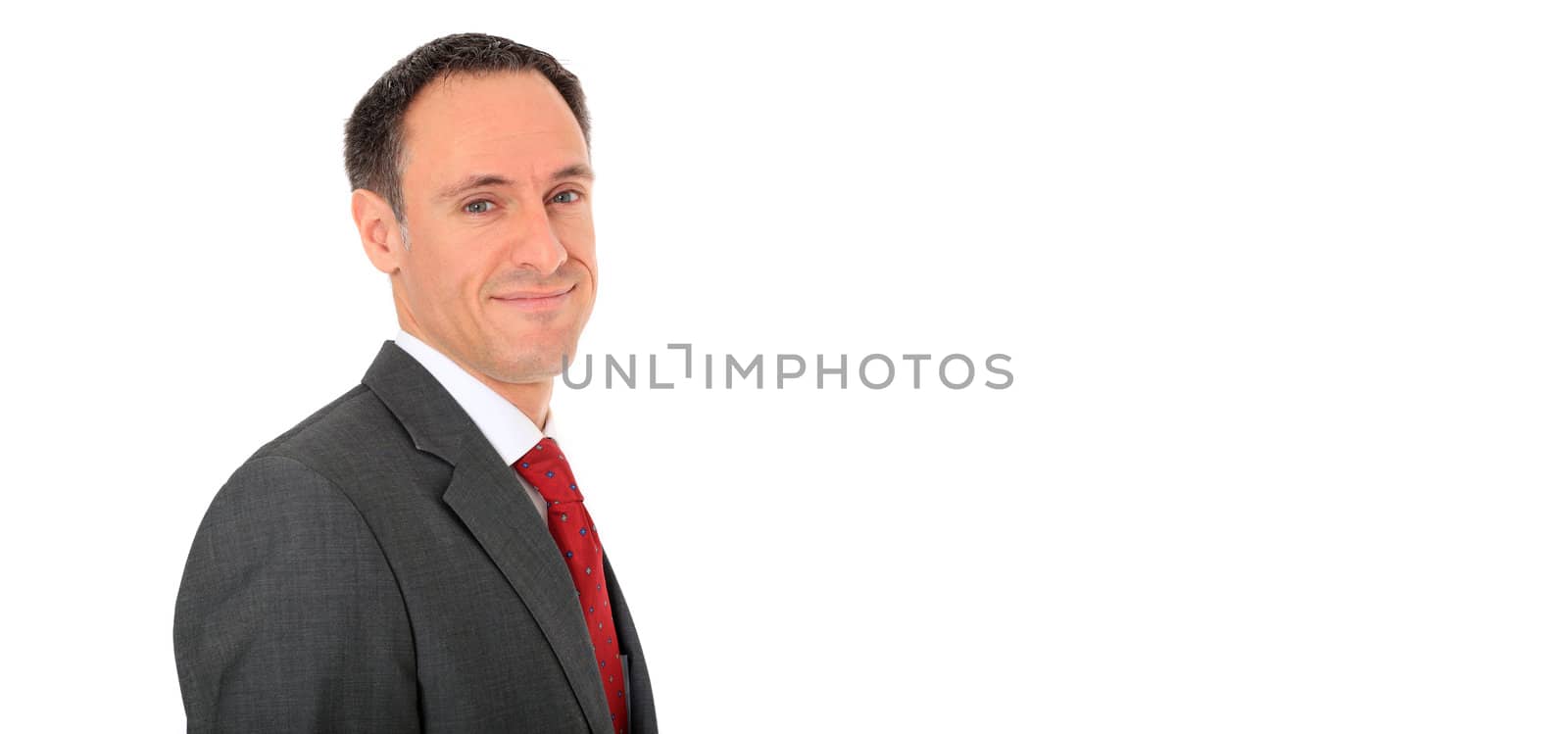 Attractive businessman. All on white background.