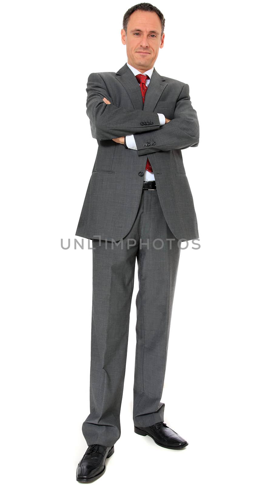 Full length image of a businessman. All on white background.