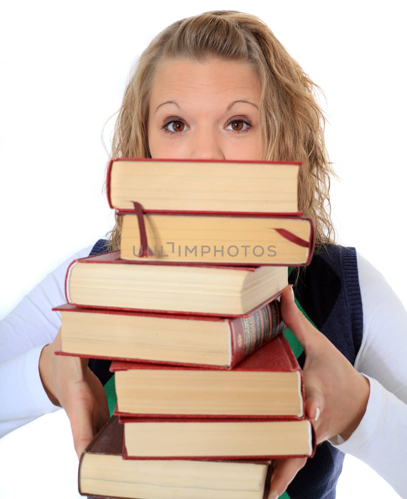 Attractive blonde woman carrying pile of books. All on white background.