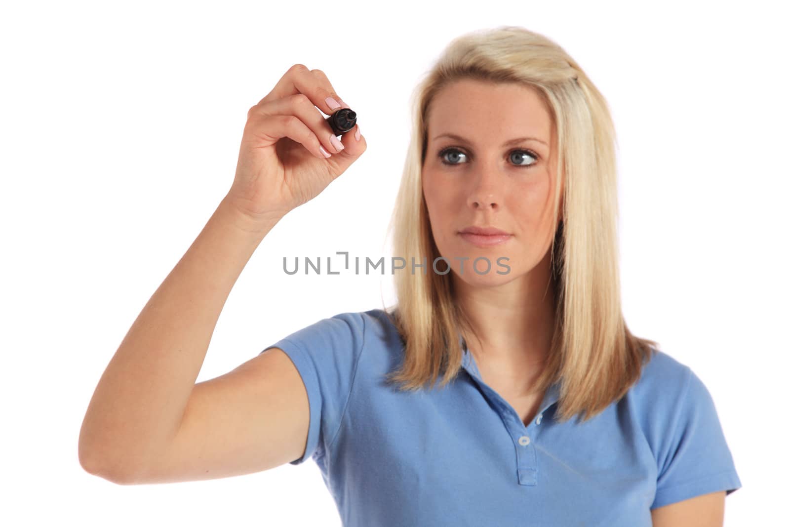 An attractive young woman uses a marker. All on white background.