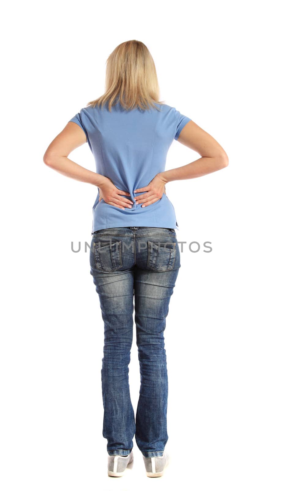 Back view of an attractive young woman suffering from backache. All on white background.