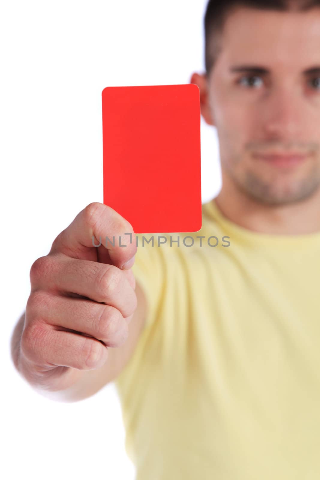 Attractive young man showing red card. All on white background.